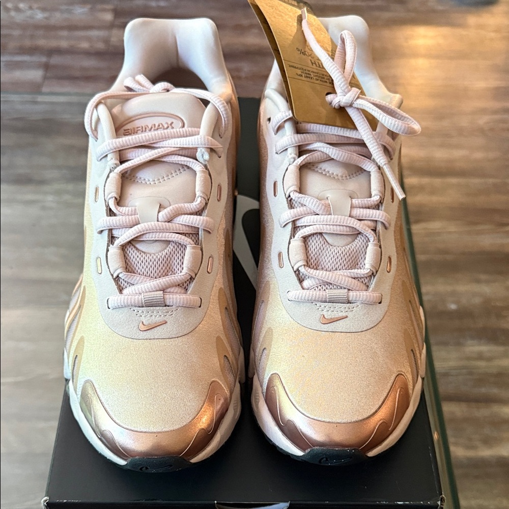 Nike Women's Light Pink Athletic Sneakers with Metallic Rose Accents